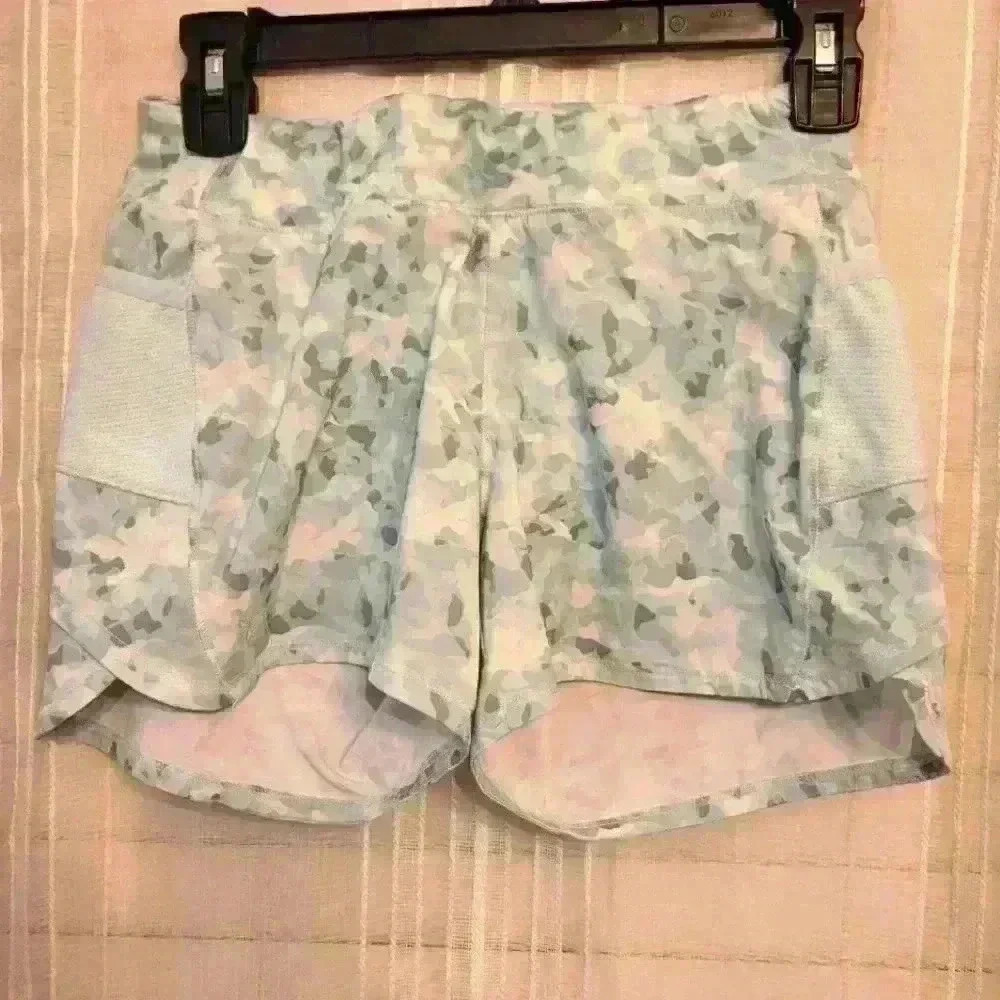 EUC girl's Athleta shorts, size 11/12, green/blue modern print, $11